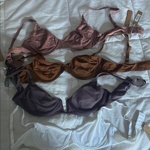 SKIMS Underwire Bra Set in copper, marble, plum and rose clay